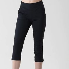 Brand New !! Excellent Condition!!The Katie Is Our Bestselling Women's Golf Pant. Capri-Style Length Hits Right Below The Knee And A Nylon-Spandex Fabric Blend Is Lightweight And Ultra-Comfortable. The Katie's Versatile, Classic Style Makes Them Well Suited For Off The Golf Course, Too. Available In Four Neutral Colors, These Bottoms Are A Comfy Addition To Any Outfit. Black Stretch Pants, Short Length, Black Stretch Pants With Short Length, Black Stretch Pants Short Length, Fitted Capri Length Bottoms For Work, Solid Fitted Capri Length Pants, Black Short-leg Pants For Workwear, Fitted Workout Pants Short Length, Black Short Leg Pants For Work, Fitted Short Workout Pants