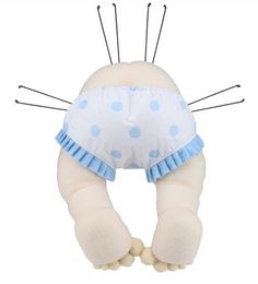 a stuffed animal with blue and white polka dots on it