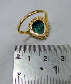 Emerald Ring, vintage18 K solid gold hallmarked, Natural emerald Diamond gemstone ring. Beautiful collection piece in very good condition. USA ring size -7.5 ( we can adjust size), size of top-16.5/15.5 mm, emerald weight-4 carat, diamond weight-0.63 carat VS G. Gold Teardrop Emerald Ring, Pear-shaped Gold Emerald Ring, Yellow Gold Teardrop Emerald Ring For Anniversary, Pear-shaped Emerald Ring For Anniversary, Pear-shaped Emerald Anniversary Ring, Gold Pear-shaped Rings With Bezel Setting, Gold Emerald Pear-shaped Ring, Gold Pear-shaped Emerald Ring, Pear-shaped Gold Rings With Bezel Setting