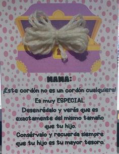 a sign with a bow on it in spanish