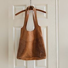 Used Once Or Twice Pristine Condition. Like New. Textured Leather Bucket Bag In Pouch Shape For Everyday, Everyday Textured Leather Hobo Pouch Bag, Textured Leather Pouch Bag For Everyday Use, Textured Leather Pouch For Everyday Use, Textured Leather Everyday Pouch Bag, Everyday Bucket Bag In Textured Leather, Lily Bag, Favorite Purse, Large Leather Tote