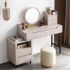 a dressing table with a mirror and stool