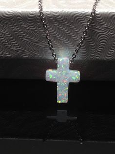 925 Sterling Siler White Opal Cross Pendant Necklace - Metal: 925 Sterling Silver (Finish: Rhodium Plated) - Stone: Simulated/Synthetic White Fire Opal - Shape: Cross   - Pendant Dimension: 12mm(0.47 in) x 9mm(0.35 in) x 2.5mm, Thickness 2.8mm - Light Cable Chain: 17.75" Adjustable (15.75" + 1" + 1"), Spring Ring Clasp - Color: Silver Sterling Silver Cross Necklace, Cross Pendant Necklace, Metal Necklaces, White Opal, Fashion Jewelry Necklaces, Sterling Silver Pendant, Spring Rings, Fire Opal, Cable Chain