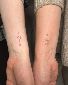 two people with matching tattoos on their arms