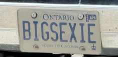 a license plate that says, bigsexie yours to discovery on the side of a car