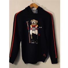 This Hooded Sweater Features Our Iconic Polo Bear Dressed For A Day On The Slopes. Shell: 100% Cotton. Design: 81% Wool, 19% Cotton. Machine Washable. Size Medium Has A 21.5" Body Length (Front And Back) And A 20.5" Sleeve Length. Hood. Long Sleeves With Rib-Knit Cuffs. Polo Bear Intarsia-Knit At The Center Front. "Rl" Cross-Stitched At The Left Hem. Rib-Knit Hem. Imported. Style Number: 629069 Color: Black Size: Boys Large 14-16 (160cm) Condition: New With Tag, New In Plastic Ships From Smoke F Ralph Lauren Long Sleeve Winter Tops, Ralph Lauren Long Sleeve Winter Sweater, Ralph Lauren Winter Streetwear Outerwear, Black Ralph Lauren Winter Outerwear, Ralph Lauren Black Outerwear For Winter, Ralph Lauren Black Winter Outerwear, Ralph Lauren Winter Outerwear For Streetwear, Ralph Lauren Hooded Hoodie For Streetwear, Ralph Lauren Long Sleeve Sweatshirt For Streetwear