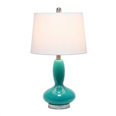 a blue lamp with a white shade on it's base and a silver base