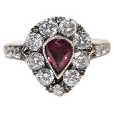 In very good condition. Total weight is 5 grams. Totally is diamond 1.05 ct. The diamond is has G color and vvs-vs-s1 clarity. Totally is ruby 0.50 ct. Ring size is US 6.5 (We offer free resizing) We can make any size. Box is not included. Please contact for any questions. Diamond Cluster Ruby Ring With Diamond Accents, Ruby Ring With Diamond Cluster And Brilliant Cut, Cluster Ruby Ring With Brilliant Cut Diamonds, Cluster Diamond Ring With Vvs Clarity And Ruby, Ruby Cluster Diamond Ring, Fine Jewelry Pear-shaped Ruby Ring With Diamond, Classic Ruby Ring With Rose Cut Diamond Cluster, Diamond Ruby Ring With Prong Setting In Pear Shape, Cluster Ruby Ring With Rose Cut Diamonds