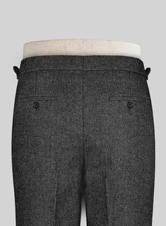 Smart gray pants are a foundational building block for your suiting wardrobe. Crafted from pure wool, the Vintage Dark Gray Weave Tweed pants are elegant and up to date choice for those in the sartorial know. 
 
 Look Includes  Vintage Dark Gray Weave Tweed Fabric  Cross Pocket  Forward 2 Pleats  Side Tabs (No Loops)- Arrow Shape  Bottom Cuff (1.5")  Two Welted Back Pockets on Trousers   
 You can change the look during customization if required. 
 
 Lining: Viscose, Dry Clean. Classic Pants With Herringbone Pattern For Tailoring, Classic Tailored Bottoms With Herringbone Pattern, Formal Tweed Pants With Herringbone Pattern, Classic Bottoms With Herringbone Pattern, Elegant Tweed Pants For Business, Classic Tweed Business Pants, Tailored Tweed Pants For Business, Tailored Tweed Pants For Formal Occasions, Formal Fitted Bottoms With Herringbone Pattern