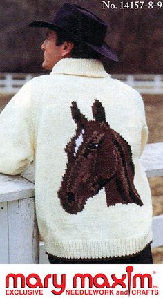 a woman wearing a sweater with a horse on it