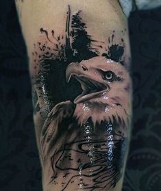 an eagle tattoo on the arm