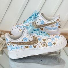 🌸 Step into your special celebration with style and grace, courtesy of our exquisite custom Nike shoes. These sneakers have been transformed to add a touch of elegance to your Sweet Sixteen or Quinceañera party, ensuring you stand out on your big day. 🌸 Who says sneakers can't be both chic and comfortable? We've redefined the rules! Our shoes are designed for dancing the night away without any discomfort. You can twirl and dance until dawn in absolute comfort. 🌸 Customization is at your finge Customizable Round Toe Wedding Shoes, Customizable Round Toe Wedding Shoes For Bridal Shower, Quince Shoes Sneakers, Quinceanera Shoes Heels, Quinceañera Shoes, Sweet 16 Shoes, Quince Shoes, Baby Blue Quinceanera, Light Blue Quinceanera Dresses