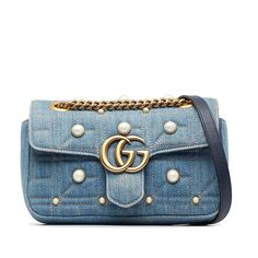 The Italian fashion house of Gucci continues to reinterpret its rich heritage under current Creative Director Alessandro Michele (2015). Maintaining a balance between historical reference and contemporary eclectic flare, the brand’s signature “double g” remains iconic. Gucci has been recognized as a worldwide leader in the luxury goods market for 90 years. Gg Marmont Mini, Quilted Denim, Gucci Mini, Mini Blue, Gucci Gg Marmont, Gg Marmont, Timeless Handbag, Luxe Fashion, Bags Designer Fashion