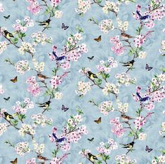 a blue background with birds and flowers on it