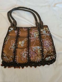 Handmade handbag... A colourful and unusual bag, handmade in the heart of pakistan sindh using original materials and traditional methods of patchworking and embroidery.. Sindhi Embroidery, Handmade Handbag, Top Handle Bags, Handmade Handbags, Bag Handmade, Cat Drawing, In The Heart, Purses And Handbags, Top Handle