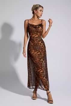 It will get all eyes is our Maisie Leopard Printed Maxi Dress. Elegant long dress design with beautiful leopard print elements. This wardrobe must-have creates a sharp and elegant feminine image. You can keep it elegant by pairing it with heels and a clutch for an impactful outfit.  Dress Length: Approx 159cm Materials: Polyester Gentle Dry Clean Only  Model is 5 ft 7 and wears size S  Colour may vary due to lighting on images. The product images (without model) are closest to the true colour of Dresses For Big Breasted Women, Funky Formal, Maxi Dress Elegant, Elegant Long Dress, Glitter Wedding Dress, Gold Maxi Dress, Dress Elegant Long, Leopard Print Maxi Dress, Long Dress Design