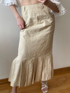 Vintage loose linen skirt in beige, mermaid style, ankle length, straight, mid-rise, fits S-M, made of 55% ramie and 45% cotton, acetate lining, excellent condition Ramie is one of the oldest fiber crops, having been used for at least 6,000 years, and is principally used for fabric production. This skirt is perfect for everyday wear, office looks, and special occasions, e.g., weddings, anniversaries, etc. The skirt is made of high-quality and rare fabrics. Measurements  Waist 73 cm / 28.7" Hips Fitted Flare Maxi Skirt For Spring, Fitted Beige Linen Maxi Skirt, Beige Linen Maxi Skirt For Spring, Fitted Beige Lined Maxi Skirt, Chic Beige Linen Maxi Skirt, Elegant Beige Linen Skirt, Elegant Spring Bottoms With Flared Hem, Elegant Linen Lined Skirt, Fitted Linen Flared Skirt