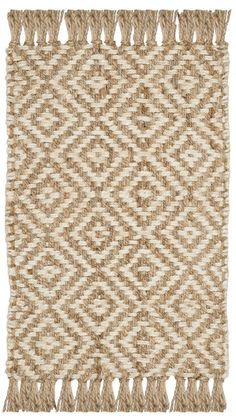 an area rug with fringes on the bottom and side, in neutral colors that are woven