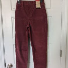 Elevate Your Denim Game With These Levi's High-Waisted Mom Jeans Cords In Size 25x27. The Red Corduroy Fabric Wash And Relaxed Fit Make Them A Stylish Addition To Any Wardrobe. The Zip And Button Closure, Along With The High Waist And Medium Inseam, Ensure A Comfortable And Flattering Fit. Perfect For Any Occasion, These Levi's Mom Jeans Are A Must-Have For Any Fashion-Forward Woman. The Brand's Quality And Attention To Detail Are Evident In The Durable Fabric And Stylish Design. Don't Miss Out Levis Mom Jeans, High Waisted Mom Jeans, Corduroy Fabric, Levi's Jeans, Levis Jeans, High Jeans, Stylish Design, Mom Jeans, Levi's