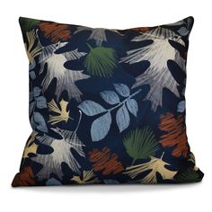 a blue pillow with leaves on it