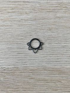 "This septum piercing is made of high quality surgical steel with beautiful black coating. Piercing \"clicks\" into place Also available in rose gold: https://www.etsy.com/listing/1042353878/rose-gold-minimalist-septum-piercing?ref=shop_home_active_1&frs=1 Also available in gold: https://www.etsy.com/listing/1042355374/gold-minimalist-septum-piercing-septum?ref=shop_home_active_1&frs=1 Details & Size: ♥ Surgical Steel ♥ Black coating ♥ Nickel Free ♥ Every purchase comes with an Elara Black Internally Threaded Belly Ring, Black Septum Ring Gift, Adjustable Black Nickel-free Body Jewelry, Adjustable Black Nickel-free Piercings, Minimalist Black Hypoallergenic Rings, Black Septum, Cute Septum Rings, Gold Septum, Septum Piercing Jewelry