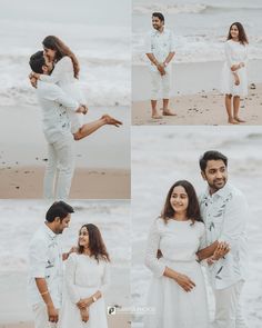 a man and woman standing on the beach with their arms around each other as they pose for pictures