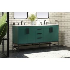 a bathroom vanity with two sinks and green cabinet