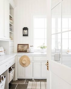 the kitchen is clean and ready to be used as a laundry room or mudroom