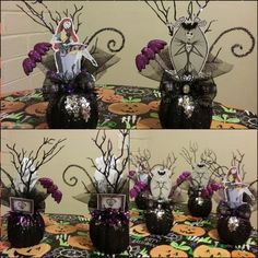 halloween decorations in black vases with purple flowers and skeleton figurines on top