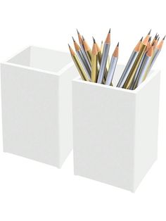 several pencils are in a square white container