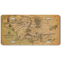 a wooden license plate with the map of middle earth