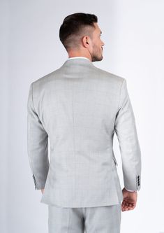 This Off-White Prince Of Wales Suit is made from superior quality wool fabric. The subtle yet standout prince of wales pattern is custom tailored to fit your unique style. Look stylish and confident in this exceptional light grey fabric, made just for you. Fitted Gray Double Breasted Suit For Office, Gray Tailored Double Breasted Suit For Business Casual, Elegant Gray Tweed Jacket For Formal Occasions, Fitted Gray Tweed Jacket For Business Casual, White Fitted Cotton Silk Bandhgala, Fitted Gray Double Breasted Suit, Fitted Gray Tweed Jacket For Business, Fitted Gray Tweed Jacket For Workwear, Elegant White Tweed Jacket For Business