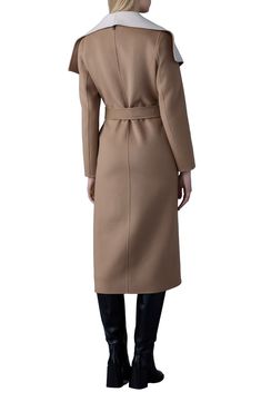 A supple double-faced wool from Italy lends a soft and cozy feel to a timeless wrap coat with a face-framing oversized collar and an elegant midi length. 50" length (size Medium) True-wrap style Shawl collar Removable tie belt Front welt pockets 100% wool Dry clean Imported Elegant Long Camel Wool Coat, Elegant Long Camel Coat, Beige Wool Coat With Shawl Collar For Fall, Beige Shawl Collar Wool Coat For Fall, Wool Wrap Coat, Wool Coats, Oversized Collar, Wrap Coat, Down Parka