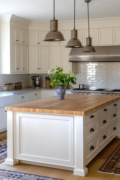 36 Stylish Butcher Block Island Ideas for Your Kitchen Overhaul Butcher Block Island With Seating, Light Butcher Block Countertops, Kitchen With Butcher Block Island, Kitchens With Butcher Block Countertops, Kitchen Island With Butcher Block Top, Butcher Block Countertops Island, Butcher Block Countertops Kitchen, Kitchen Butcher Block, Kitchen Restoration