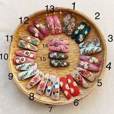 a basket filled with lots of different types of slippers on top of a table