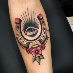 an all seeing eye tattoo on the arm