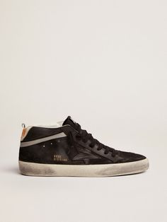 Men's Mid Star in nubuck with black leather star and silver flash | Golden Goose Black Suede High-top Sneakers With Studded Outsoles, Black Suede High-top Sneakers With Branded Insole, Black Leather Skate Shoes With Contrasting Heel Counter, Black Leather Skate Shoes With Contrasting Heel, High-top Leather Skate Shoes With Contrasting Heel, Modern Black High-top Sneakers With Speckled Midsole, Black Suede High-top Sneakers With Vulcanized Sole, Black Leather Skate Shoes With Speckled Midsole, Scene Inspiration