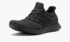 Now on its fourth iteration, the adidas Ultra Boost continues its dominance as the most popular performance running shoe on the lifestyle sneaker market thanks to its perfect blend of great looks and amazing comfort.  No Ultra Boost collection should be without a “Triple Black” pair, and the new Ultra Boost 4. 0 has already taken care of that need with this edition released in early 2018.  The main difference to the Ultra Boost 4. 0 is the new striped texture on the Primeknit upper, which as you Adidas Ultraboost, Stadium Goods, Adidas Ultra Boost, Ultra Boost, Triple Black, The Lifestyle, Running Shoe, Adidas Men, All Black Sneakers