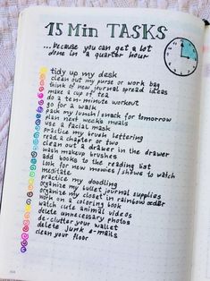 an open notebook with the words 15 min tasks written in rainbows and black ink