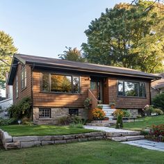 a house with landscaping in the front yard