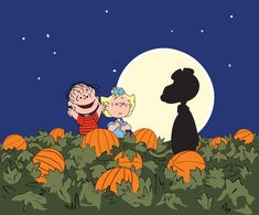 charlie and snoop on pumpkin patch with full moon in background