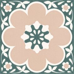 a green and white tile with an intricate flower design in the center, on top of it