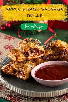 apple and sage sausage rolls on a plate with ketchup in a small bowl