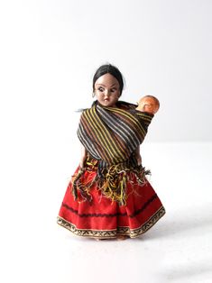 "This is a vintage Mexican costumed doll.  The sleepy eye doll carries her baby wearing traditional dress. CONDITION In good condition with wear consistent with age and use.  Hair has some flyaways.  MEASUREMENTS Height:  7.25\"  ..  18.4 cm Width:  3.25\"  ..  8.3 cm Depth:  1.5\"  ..  3.8 cm 22374" Mexican Rag Doll Centerpieces, Crochet Mexican Doll, Mexican Miniatures, Mexican Barbie Doll, Maria Dolls Mexican, British Guard, Leather Suitcase, Antique Trunk, Woven Baskets Storage