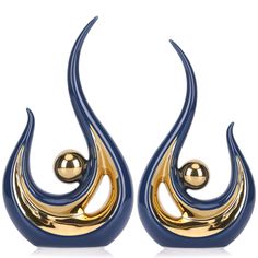 pair of blue and gold earrings on white background