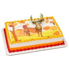 a birthday cake with an image of a deer on it