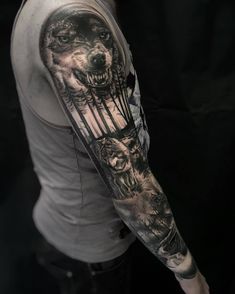 a man's arm with an animal and trees tattoo on the left sleeve, which has