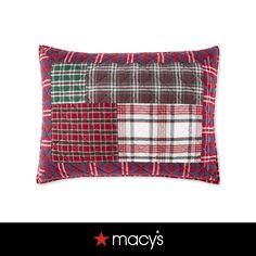 a red and green plaid pillow with the words macy's written in black on it