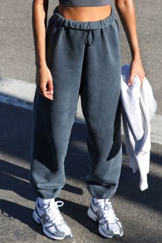 Front view of model from the waist down wearing the oversized loose fit washed navy french terry Oversized Jogger with an elastic waistband and ankle cuffs Form Fitting Tops, Pastel Outfit, Joggers Outfit, Joah Brown, French Terry Fabric, Ankle Cuffs, Oversized Silhouette, Mellow Yellow, Sports Leggings