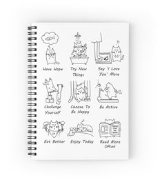 a spiral notebook with cats and other things on it